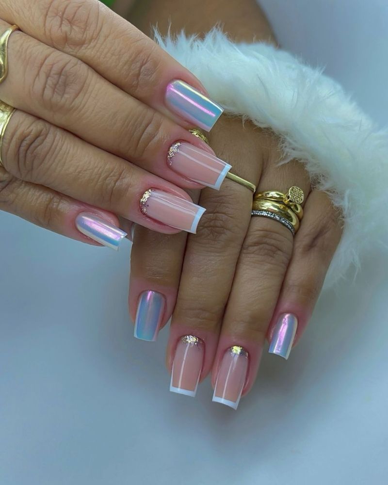 White French tip nails with chrome accents