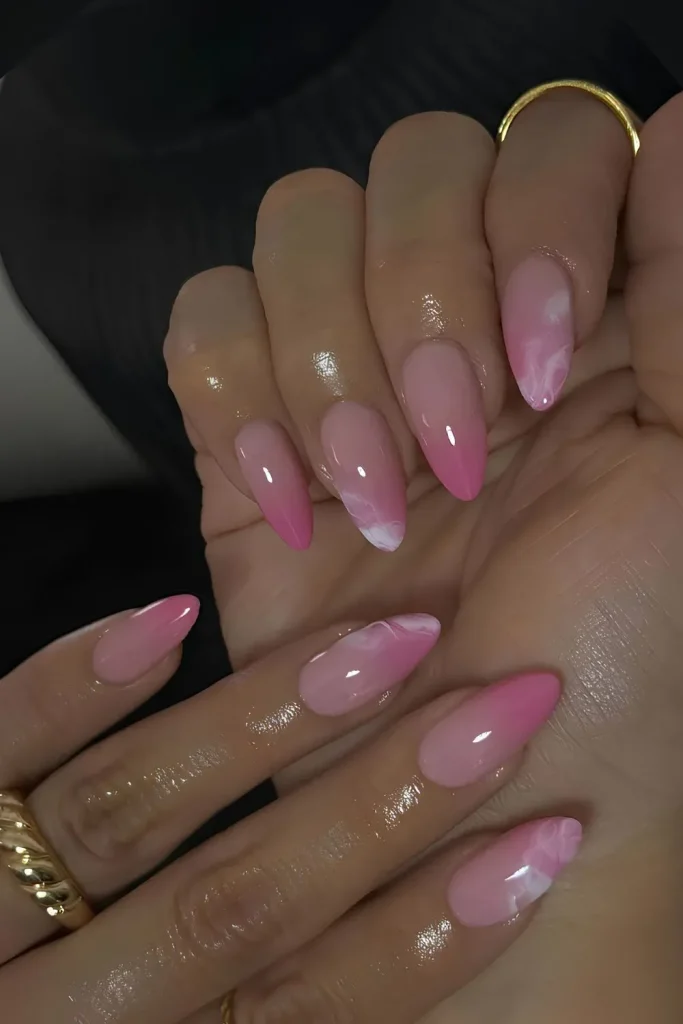 Beautiful pink marble nails with a glossy, elegant finish!