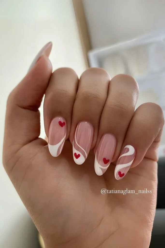 White French Tip Nails with heart and swirls