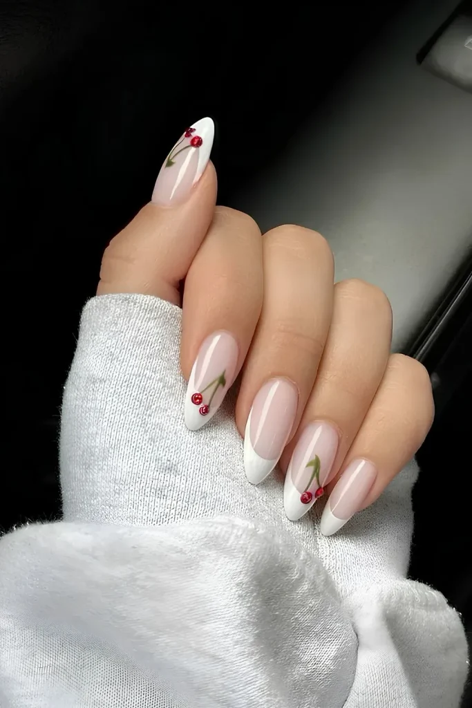 White French Tip Nails with Cherry Accents