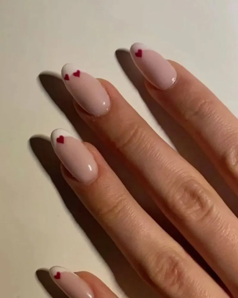  A timeless white French manicure with a clean and sophisticated finish.